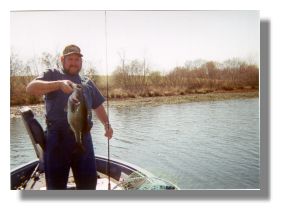 Ronnie Cearlock with a 9 pound 4 ounce bass from Bar-D Fishing Club caught on a plastic worm in April 2000