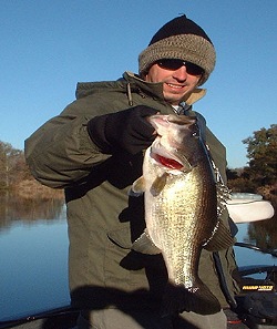 Donnie Burchfield with 6 1/2 bass from Bar-D, Dec. 03
