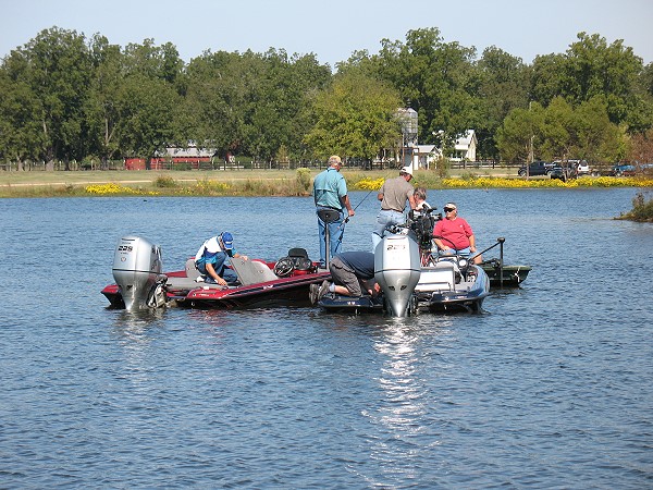 Club member, Rod Bamberg, gets an autograph from Charlie Ingram